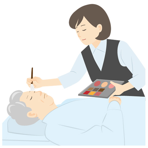 練馬区のみなと式典のスタッフが故人にメイクしている写真